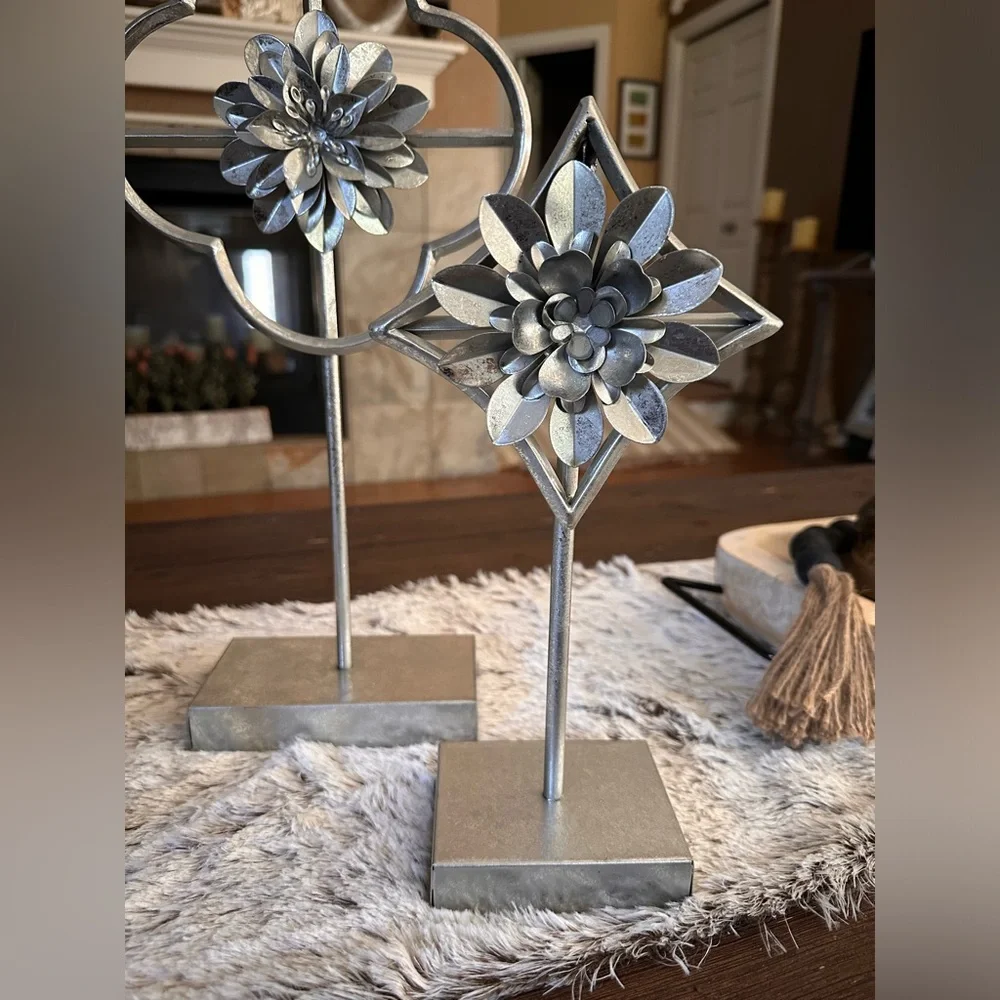 Home decor accents  two silver flowers on pedestal stand